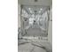Spacious walk-in shower with marble walls and built-in seating at 2809 E Frye Rd, Phoenix, AZ 85048