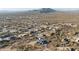 Aerial view of house in desert setting with mountain backdrop at 39720 N 7Th Street --, Phoenix, AZ 85086