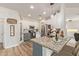 Spacious kitchen featuring granite countertops, stainless steel appliances, and two-toned cabinetry at 4446 W Hower Rd, Phoenix, AZ 85086