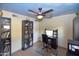 Home office with a desk and bookcases at 453 S Rosemont --, Mesa, AZ 85206