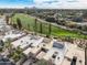 Aerial view of community with golf course in background at 4710 N 65Th St, Scottsdale, AZ 85251