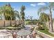 Landscaped backyard with patio and seating area at 4710 N 65Th St, Scottsdale, AZ 85251