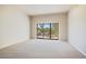 Spacious bedroom with sliding doors leading to a patio at 4710 N 65Th St, Scottsdale, AZ 85251