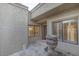Bright entryway with a wood door and window with shutters at 4710 N 65Th St, Scottsdale, AZ 85251