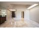 Spacious foyer with marble floors and access to kitchen at 4710 N 65Th St, Scottsdale, AZ 85251