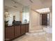 Elegant foyer with marble floors and built-in bar at 4710 N 65Th St, Scottsdale, AZ 85251