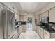 Modern kitchen featuring stainless steel appliances and granite countertops at 4710 N 65Th St, Scottsdale, AZ 85251
