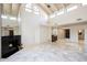 High-ceiling living room with fireplace and large windows at 4710 N 65Th St, Scottsdale, AZ 85251