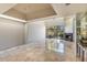 Spacious living room with marble floors and fireplace at 4710 N 65Th St, Scottsdale, AZ 85251
