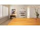 Home office with wood desk and built-in shelving at 4710 N 65Th St, Scottsdale, AZ 85251