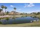Peaceful pond reflecting the homes and mountains at 4710 N 65Th St, Scottsdale, AZ 85251