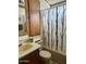 Clean bathroom with a shower/tub combo and wood vanity at 7750 E Broadway Rd # 348, Mesa, AZ 85208