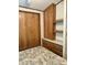 Bedroom with double bed, wood shelving, and mirrored closet doors at 7750 E Broadway Rd # 348, Mesa, AZ 85208