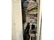 Shelved closet with folded clothes and vacuum cleaner at 7750 E Broadway Rd # 348, Mesa, AZ 85208