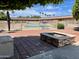 Community pool and fire pit with patio area at 7750 E Broadway Rd # 348, Mesa, AZ 85208