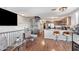 Open living area overlooking kitchen and spiral staircase at 888 W Aspen Way, Gilbert, AZ 85233