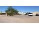 Mobile home with parking and desert landscaping at 1237 N Main Dr, Apache Junction, AZ 85120