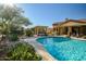 Resort style backyard oasis featuring a sparkling pool and spa at 12721 S 177Th Ave, Goodyear, AZ 85338