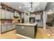 Spacious kitchen featuring an island and stylish cabinetry at 21915 E Silver Creek Ct, Queen Creek, AZ 85142