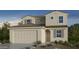 Two-story house with tile roof, neutral color scheme, and three-car garage at 25238 N 172Nd Ln, Surprise, AZ 85378