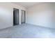 Large bedroom with double doors leading to other rooms at 37200 N Cave Creek Rd # 1023, Scottsdale, AZ 85262