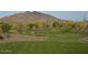 Expansive golf course with desert landscaping and mountain backdrop at 37200 N Cave Creek Rd # 1023, Scottsdale, AZ 85262