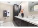 Modern bathroom with double sinks and a large mirror at 7137 E Rancho Vista Dr # 2002, Scottsdale, AZ 85251