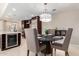 Kitchen features a round dining table with four chairs at 7137 E Rancho Vista Dr # 2002, Scottsdale, AZ 85251