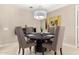 Modern dining room with round table and four chairs at 7137 E Rancho Vista Dr # 2002, Scottsdale, AZ 85251