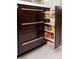 Pull out spice rack in modern kitchen cabinetry at 7137 E Rancho Vista Dr # 2002, Scottsdale, AZ 85251