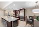 Modern kitchen with stainless steel appliances and breakfast bar seating at 7137 E Rancho Vista Dr # 2002, Scottsdale, AZ 85251