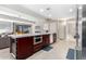 Large kitchen island with a built-in microwave and ample counter space at 7137 E Rancho Vista Dr # 2002, Scottsdale, AZ 85251