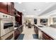Modern kitchen with island, stainless steel appliances, and breakfast nook at 7137 E Rancho Vista Dr # 2002, Scottsdale, AZ 85251