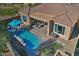 Aerial view showcasing the home's backyard pool and patio at 7387 W Cactus Wren W Way, Florence, AZ 85132