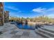 Relaxing pool and spa with stone accents at 7552 E Whisper Rock Trl, Scottsdale, AZ 85266