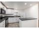 Modern kitchen with white cabinets and island at 7807 E Main St # Bb-21, Mesa, AZ 85207