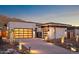 Stunning modern home with a two-car garage and desert landscaping at 14174 E Highland Ave, Fountain Hills, AZ 85268