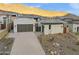 Modern house with two-car garage and landscaped front yard at 14174 E Highland Ave, Fountain Hills, AZ 85268