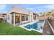 Private backyard pool with mountain views and artificial turf at 14174 E Highland Ave, Fountain Hills, AZ 85268