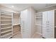 Spacious walk-in closet with ample shelving and hanging space at 14174 E Highland Ave, Fountain Hills, AZ 85268