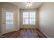 Bedroom with hardwood floors, private balcony access at 14950 W Mountain View Blvd # 1310, Surprise, AZ 85374