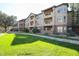 Three-story building with manicured lawn at 14950 W Mountain View Blvd # 1310, Surprise, AZ 85374
