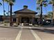 Community entrance with fountain and landscaping at 14950 W Mountain View Blvd # 1310, Surprise, AZ 85374