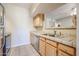 Kitchen features double sink and dishwasher at 14950 W Mountain View Blvd # 1310, Surprise, AZ 85374