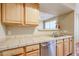 Kitchen with stainless steel appliances and wood cabinets at 14950 W Mountain View Blvd # 1310, Surprise, AZ 85374