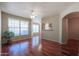 Bright living room with hardwood floors and access to balcony at 14950 W Mountain View Blvd # 1310, Surprise, AZ 85374