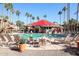 Inviting community pool with lounge chairs at 14950 W Mountain View Blvd # 1310, Surprise, AZ 85374