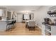 Open concept kitchen with island and view into dining area at 1739 E Pleasant Ln, Phoenix, AZ 85042