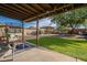 Backyard with pergola, firepit, and trampoline at 17617 N 36Th St, Phoenix, AZ 85032