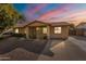 Charming single story home with a landscaped front yard and driveway at 17617 N 36Th St, Phoenix, AZ 85032